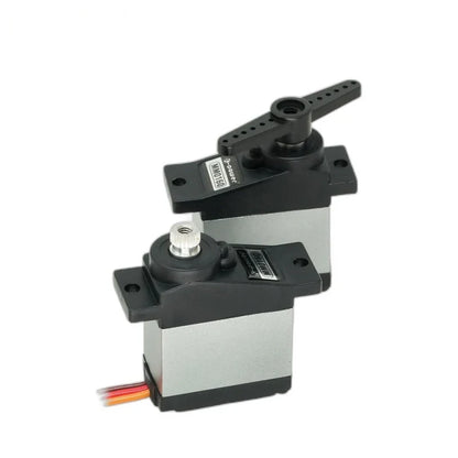 Two black and silver servos, with a bare splined shaft in front and a double-ended servo horn mounted on the rear unit.