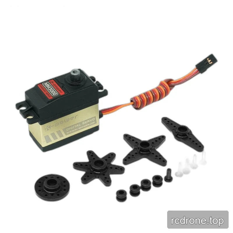 MM3000 servo with coiled cable and connector, four black servo horns, mounting bushings, and small fasteners.