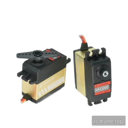 Two black and gold MM3000 servo views, one with a two-arm horn and the other showing the exposed splined shaft.