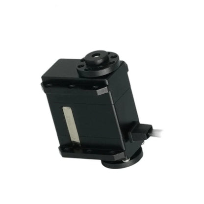 Tilted black servo with a circular top fitting, mounting holes, silver side strip, and cable extending to the right.