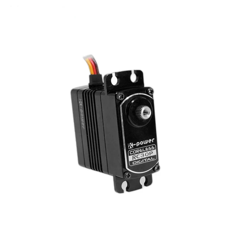 Upright black servo showing its exposed splined shaft, CORELESS RC30P DIGITAL label, and slotted mounting tabs.