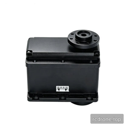 Black servo viewed slightly from above, with an open flange at upper right, a centered white connector and lower mounting holes.