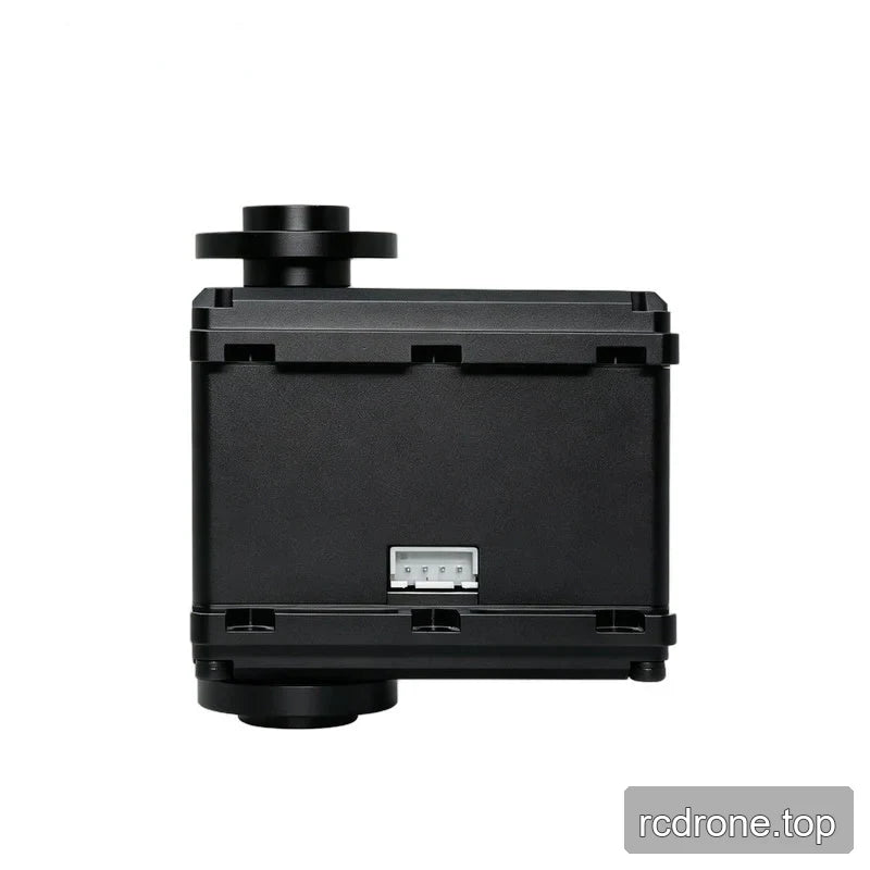 Straight-on side view of the black servo housing, showing its white connector and the profile of the upper circular flange.