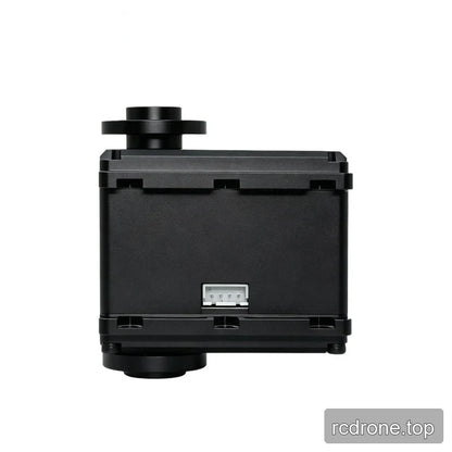 Straight-on side view of the black servo housing, showing its white connector and the profile of the upper circular flange.