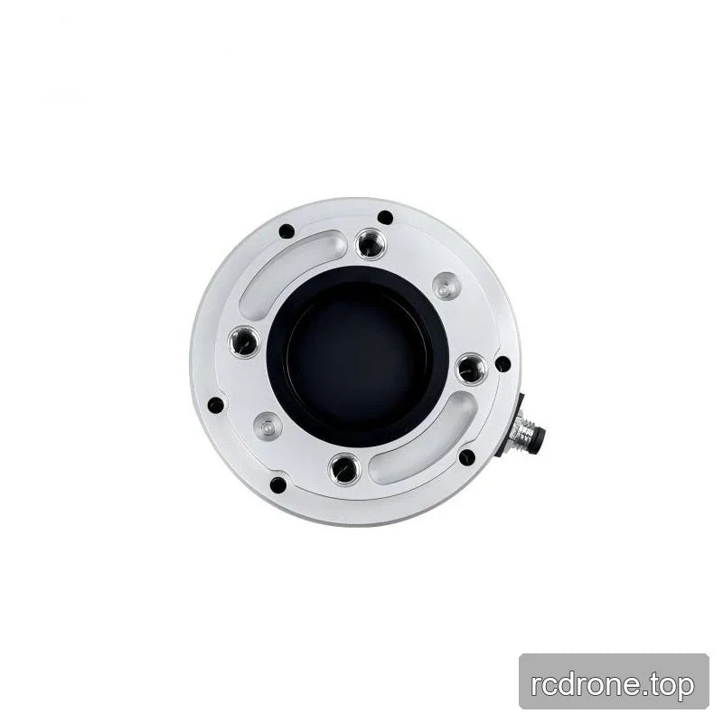 Overhead view of the silver sensor face with curved recesses, threaded holes, black center and right-side connector.