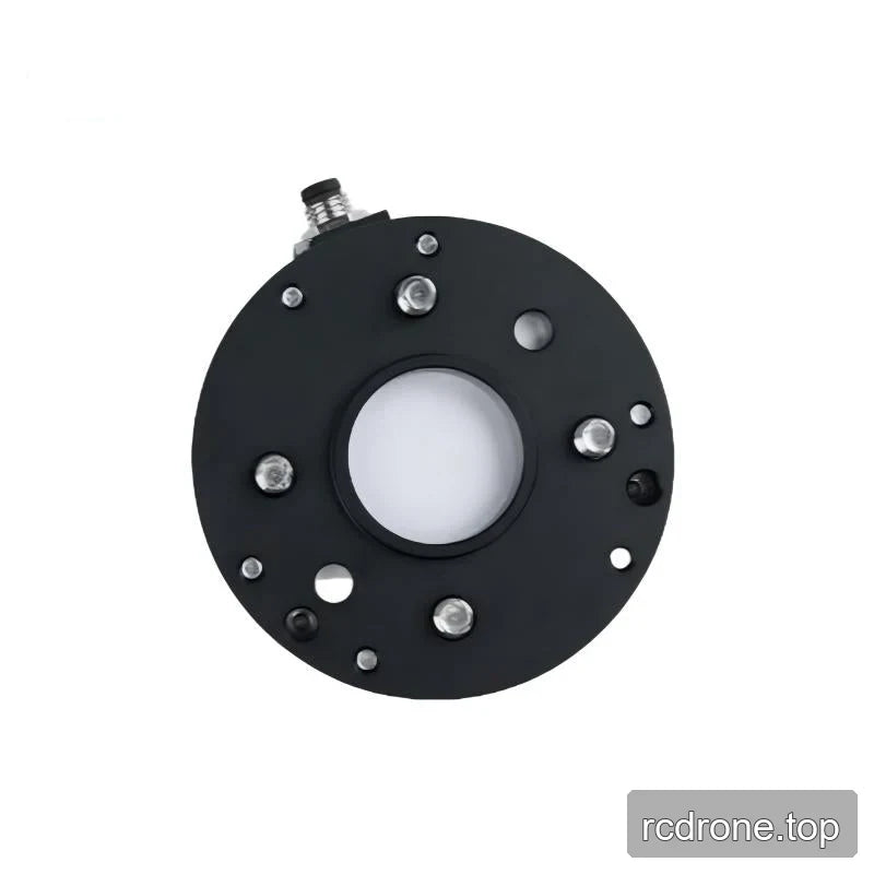 Black underside of the sensor with a central opening, silver fasteners, surrounding holes, and an edge connector.