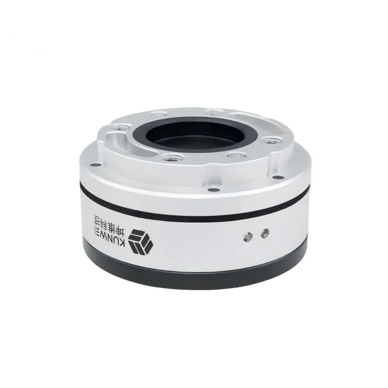 Rear angled sensor view showing side branding, two small housing holes, silver mounting flange, and black base.