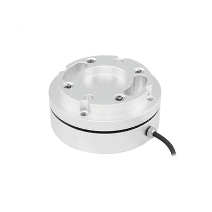 Circular silver sensor with a stepped mounting face, black housing seam, and side cable curving down to the right.