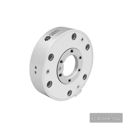 Silver sensor tilted upright, showing its open center, threaded inner ring, outer mounting holes, and thick branded sidewall.