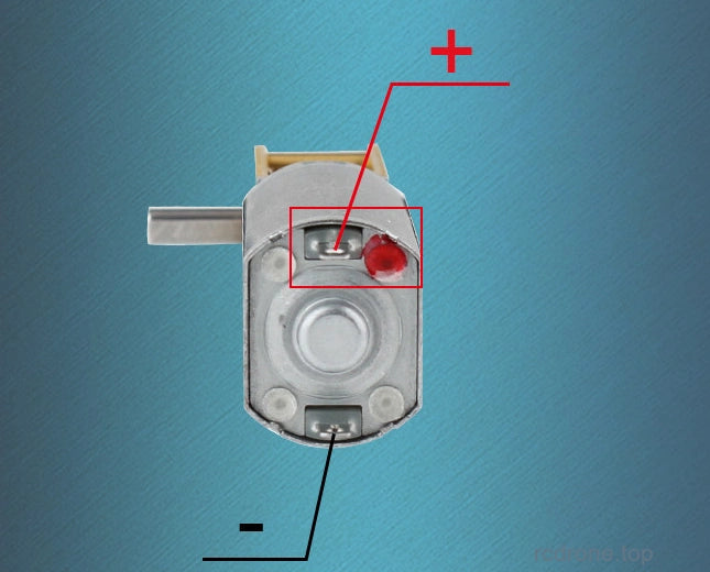 Motor rear-terminal polarity reference;red marked terminal positive