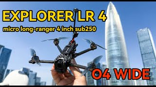Handheld Flywoo Explorer LR 4 micro long-range 4-inch FPV drone with O4 Wide camera on the front