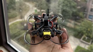 Flylens 75 HD O4 Wide 2S Whoop FPV, Handheld Flylens 75 HD whoop FPV drone with ducted prop guards and front-facing camera