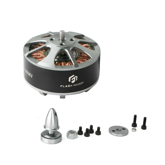 Flashhobby 4112 Brushless DC Motor, Flashhobby 4112 brushless DC outrunner motor with visible copper windings and included screws, plate and prop adapter