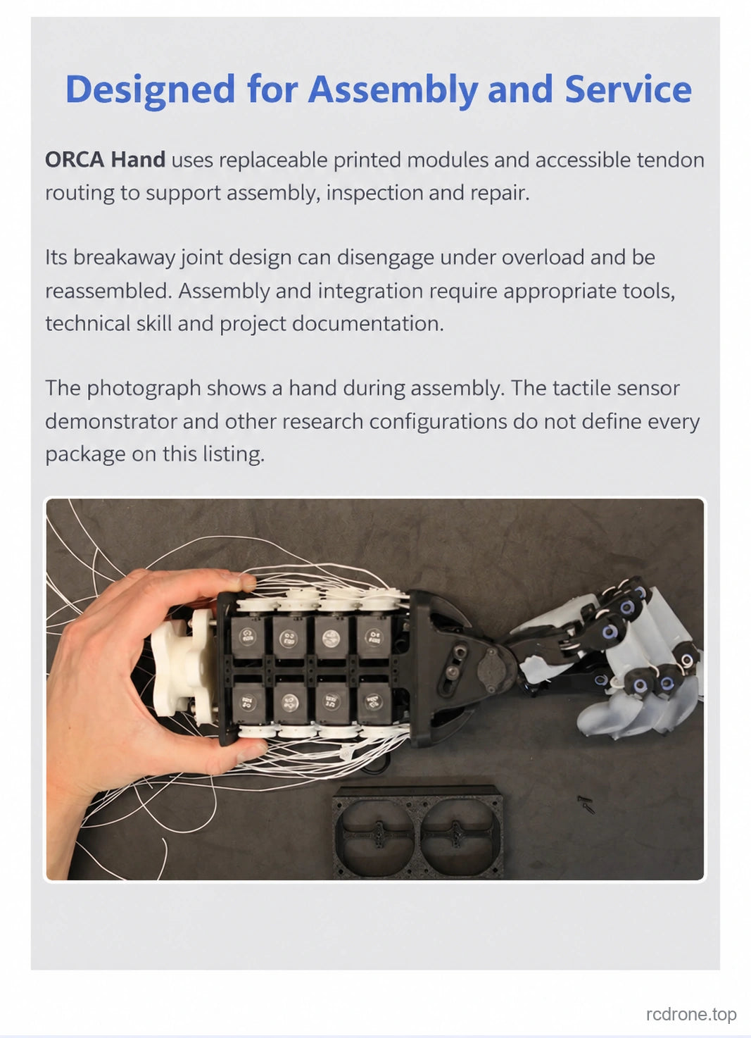 ORCA Hand assembly photograph showing tendon routing and actuators