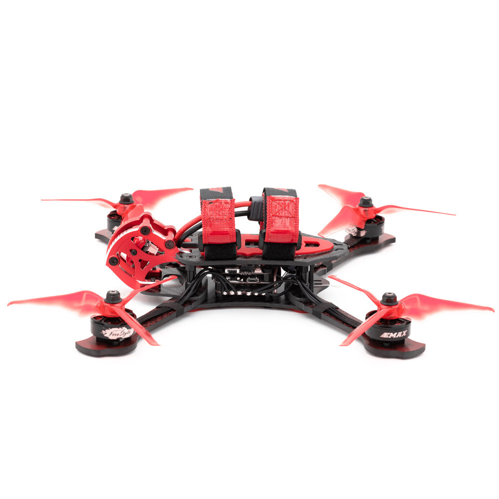 Rear view of freestyle FPV quadcopter showing dual battery straps, top plate, and rear propellers