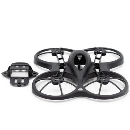 Top view of black ducted whoop frame and separate mounting plate, Tinyhawk-style layout