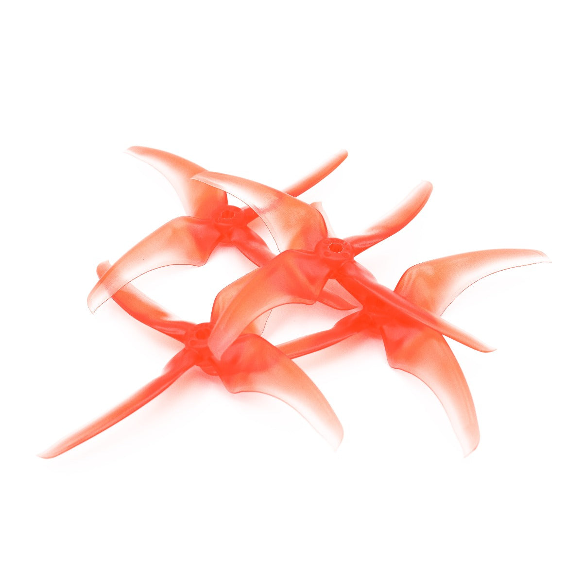 EMAX Avan Scimitar 5028 propellers set laid out, multiple 4-blade props in translucent red
