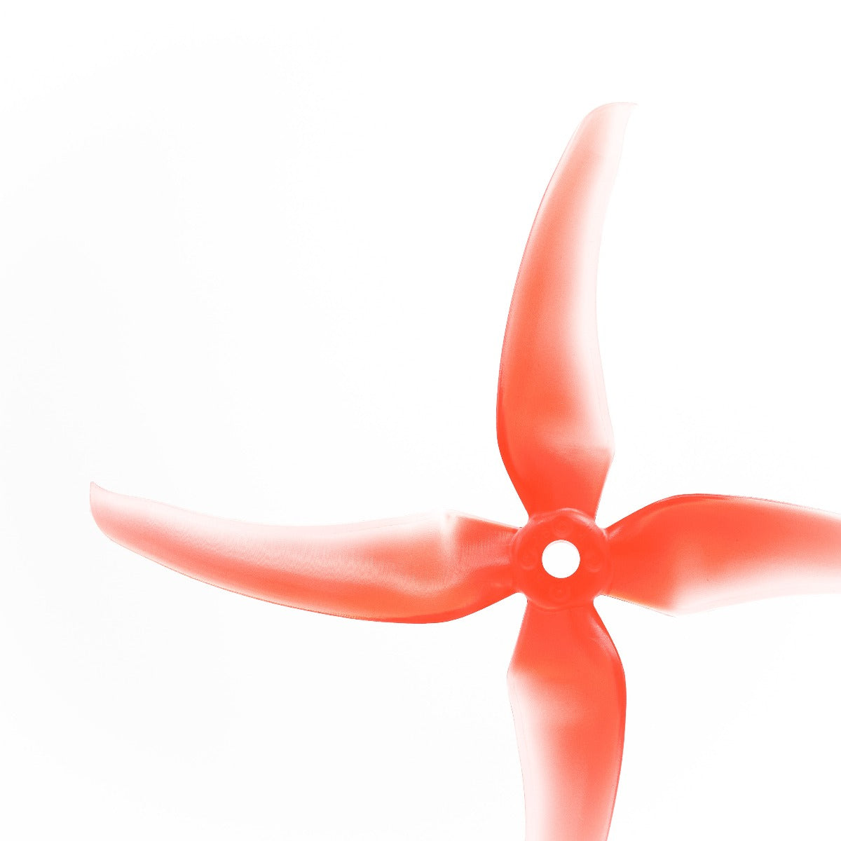 Translucent red 4-blade propeller showing center mounting hole opening