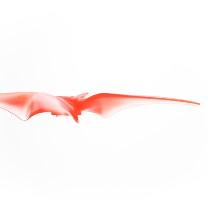 Side profile of translucent red 4-blade propeller showing blade pitch and thin edge