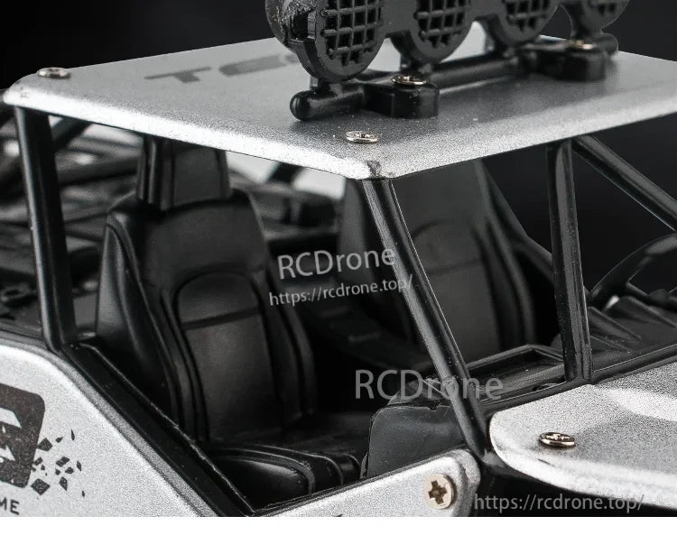 RC Off-Road Truck 1/12 4WD Alloy Climbing Car, This 1/12 scale 4WD RC truck has a rugged alloy body and dual-motor system, reaching speeds of up to 20km/h.