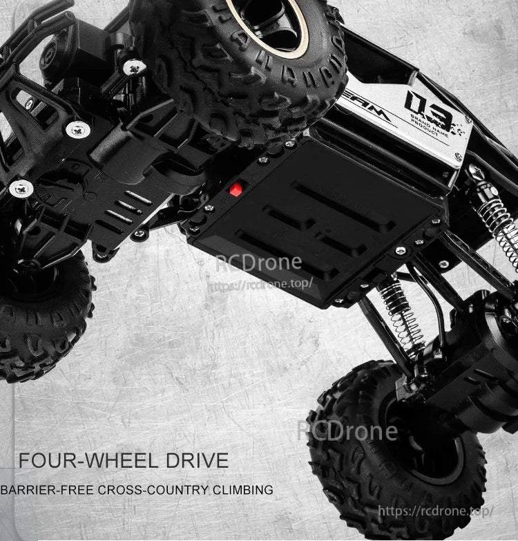RC Off-Road Truck 1/12 4WD Alloy Climbing Car, A 1/12 scale 4WD RC off-road truck with alloy chassis, rugged tires, and barrier-free climbing ability.