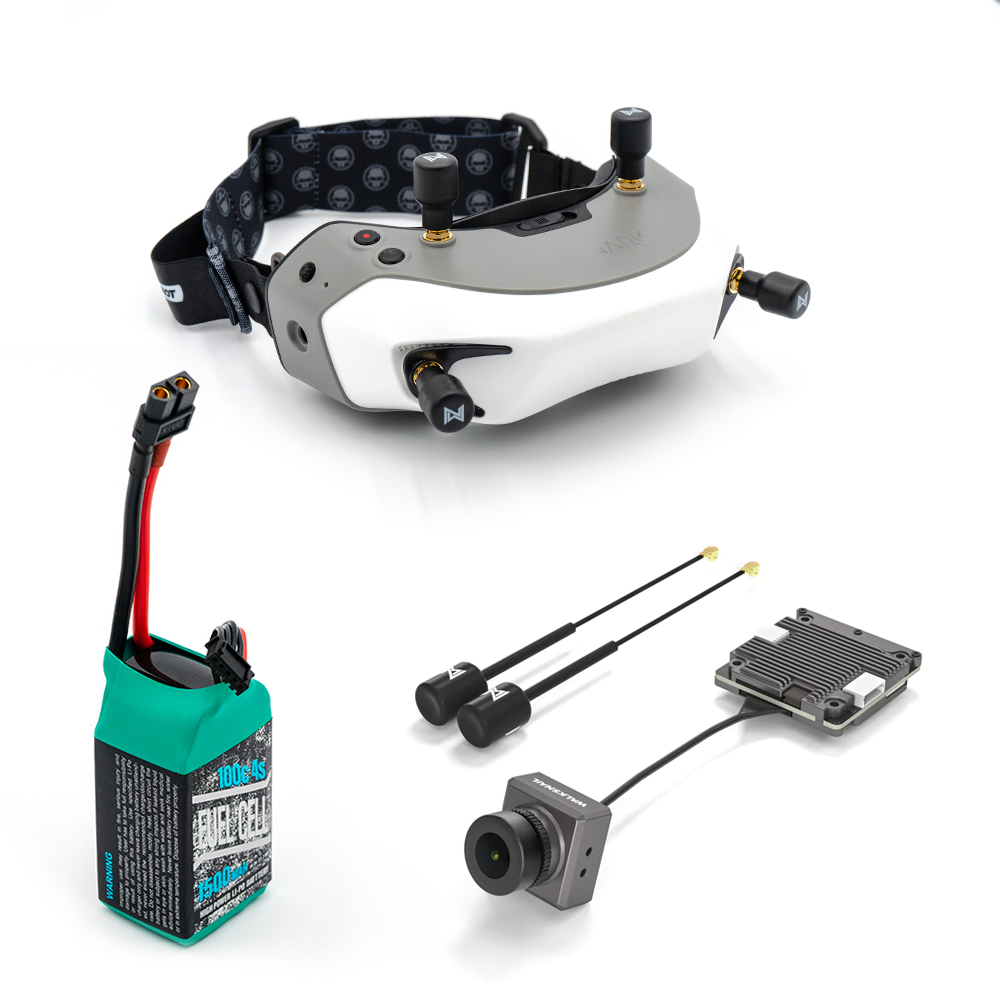 FPV goggle kit layout with four stubby antennas, battery pack, two whip antennas and camera with transmitter board
