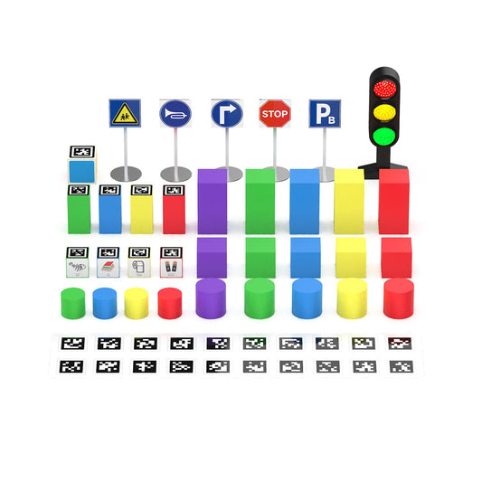 Collection of colorful traffic light and road sign models for robot car kit on a white background