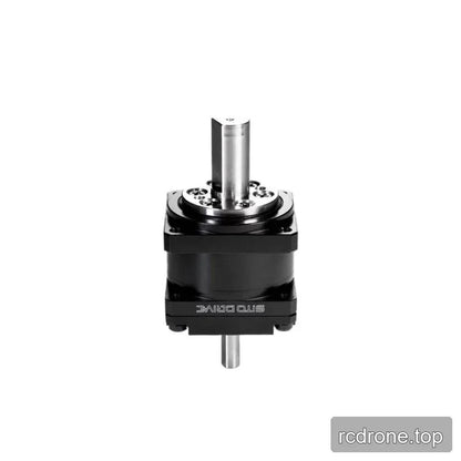 Upright reducer view highlighting the circular bolted face around the upper polished shaft.