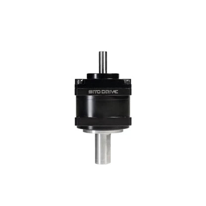Straight-on upright view of the black SITO DRIVE reducer, with upper and lower polished metal shafts.