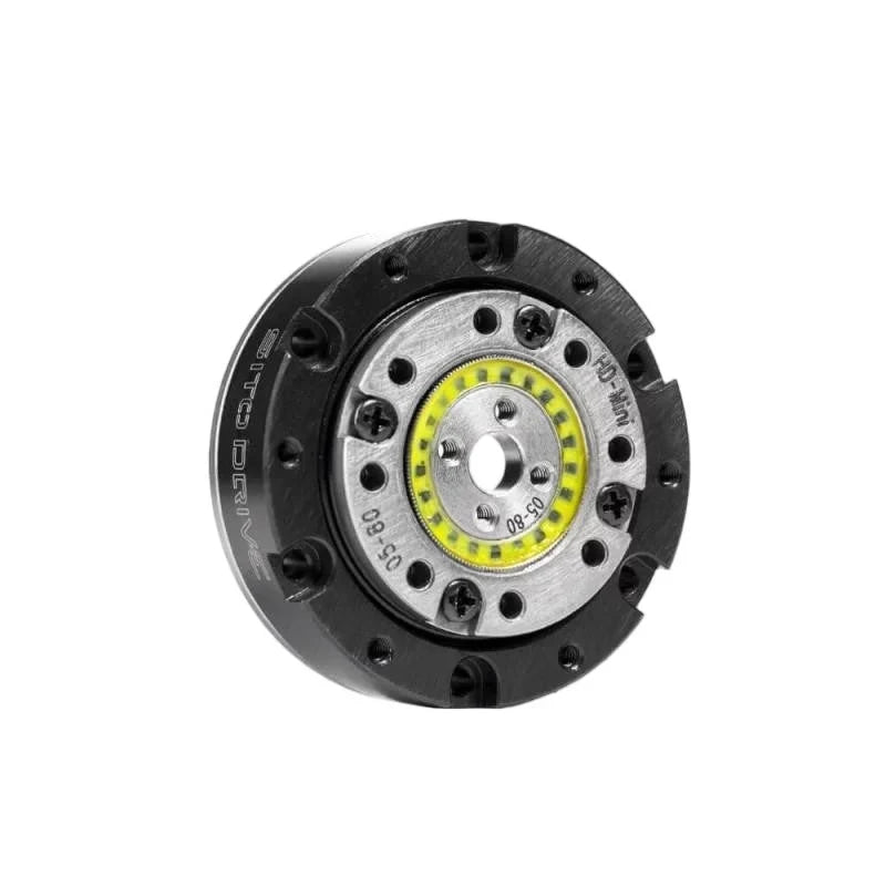Angled front view of the SITO DRIVE HD-05 reducer showing its central bore, mounting holes and yellow ring.