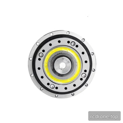 Straight-on circular reducer face with yellow inner ring, central hub opening, and evenly spaced perimeter fasteners.