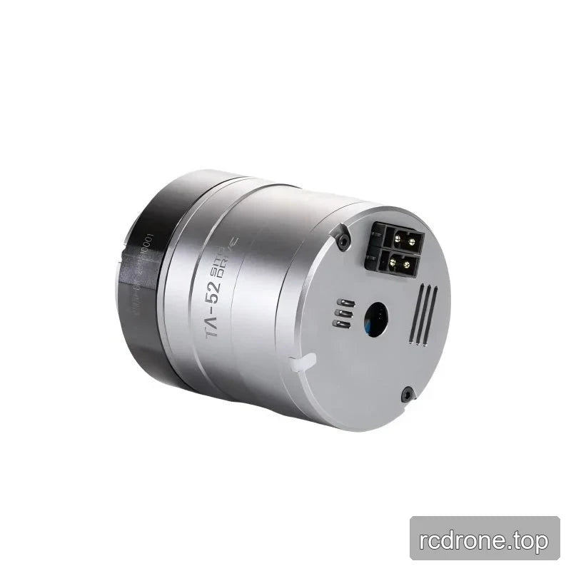 Sideways three-quarter view of the TA-52 actuator highlighting the rear terminal plate, ports, and engraved body label.