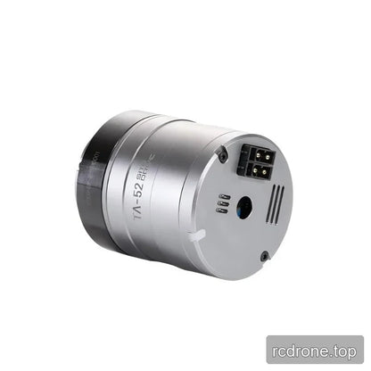 Sideways three-quarter view of the TA-52 actuator highlighting the rear terminal plate, ports, and engraved body label.