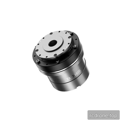 Angled top view of the TA-70 rotary actuator showing the circular bolted mounting face and central opening.