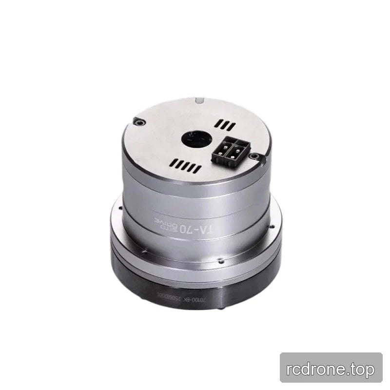 Rear-side view of the TA-70 rotary actuator showing its circular end plate, vent slots, and rectangular connector.