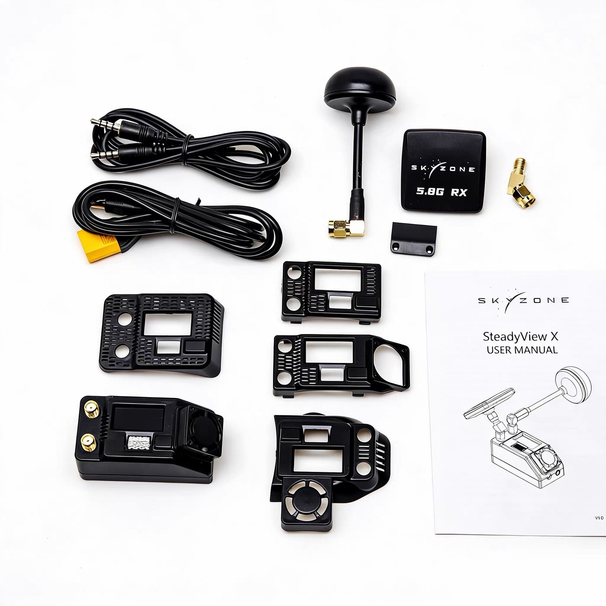 SKYZONE SteadyView X receiver kit contents with antennas, cables, faceplate shells, adapter and user manual