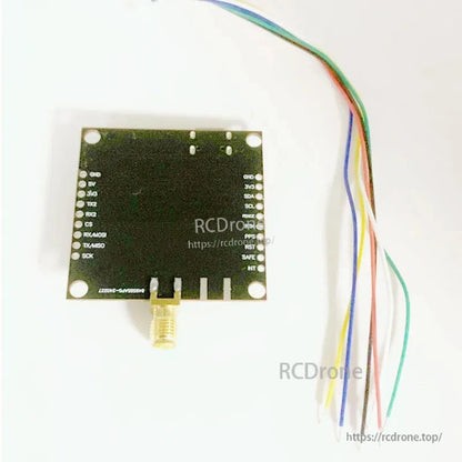 u-blox ZED-F9P GNSS RTK board with SMA antenna connector, labeled UART/I2C/SPI pins and wire harness