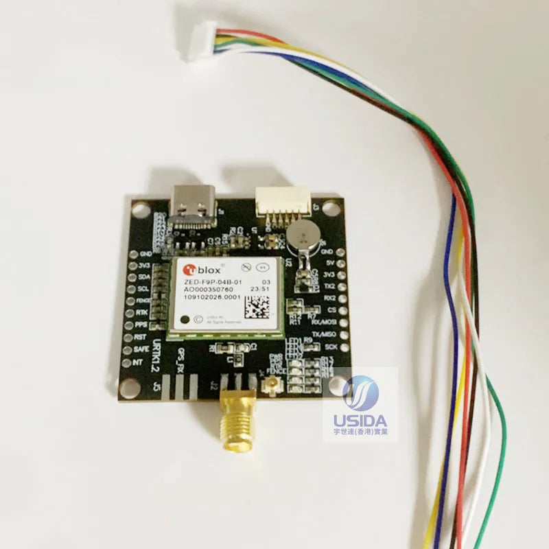 u-blox ZED-F9P GNSS RTK board with USB-C port, SMA antenna connector, and multicolor wiring harness