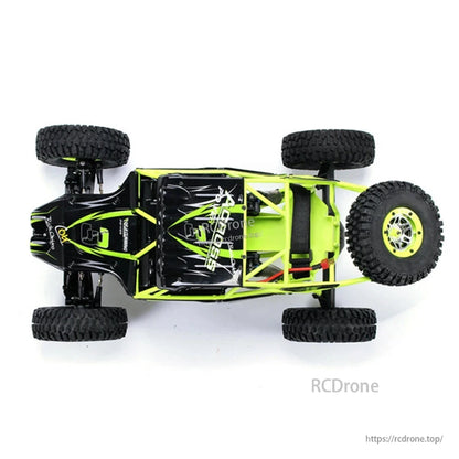 The WLtoys 10428 is a 1/10 scale 4WD RC crawler truck with a 30km/h speed, dual-speed gearbox, 2.4GHz radio, alloy gears, and a 7.4V 2200mAh battery.