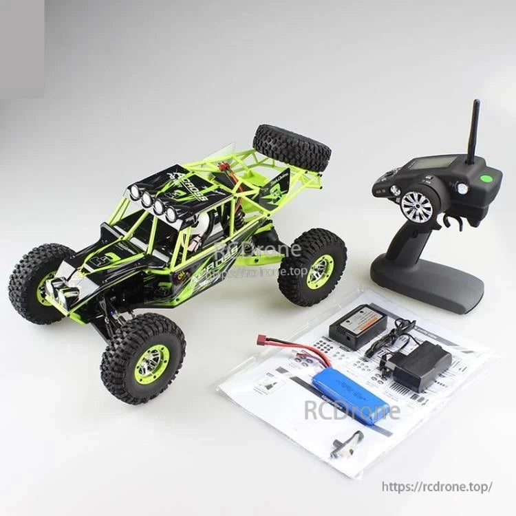 WLtoys 10428 is a 1/10 scale 4WD RC crawler truck with a 30km/h speed, dual-speed, 2.4GHz, alloy gear, and 7.4V 2200mAh battery.