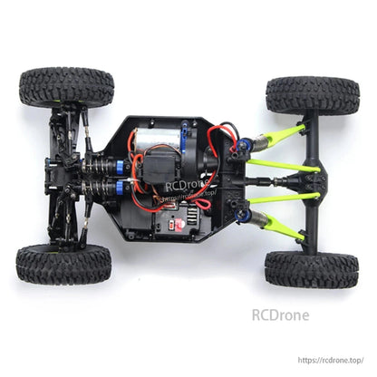 WLtoys 10428 is a 1/10 scale 4WD RC crawler truck with a 30km/h speed, dual-speed gearbox, 2.4GHz radio, alloy gears, and a 7.4V 2200mAh battery.