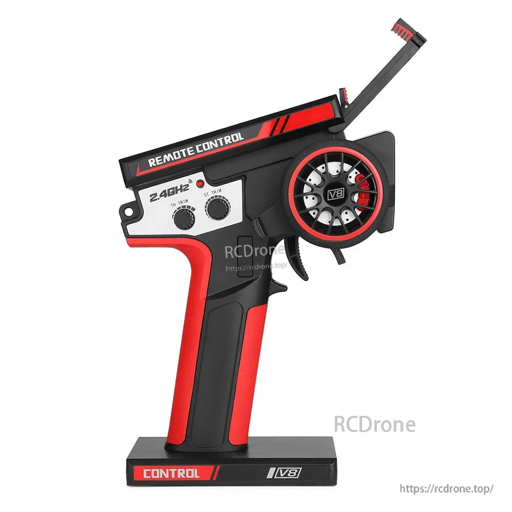 Wltoys 144010 RC Car, The V8 Remote Control operates at 2.4GHz, offering trim controls and an ergonomic design for high-speed RC car use.