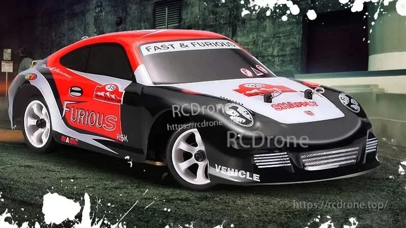 WLtoys K969 1:28 Scale RC Drift Car, The device features high-speed capabilities and power, with a 130 brushed motor allowing for a top speed of up to 30KM/H.