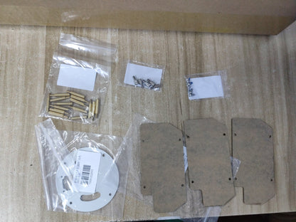 ROSMASTER M3 Pro accessory kit contents laid out: mounting plates, round base plate, standoffs and screws