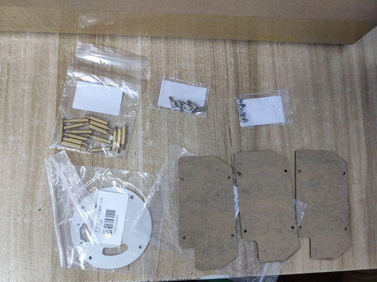 ROSMASTER M3 Pro accessory kit contents laid out: mounting plates, round base plate, standoffs and screws