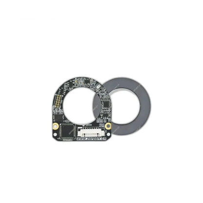 ZeroErr eCoder18 magnetic encoder circuit board shown with a separate dark gray circular magnetic ring.