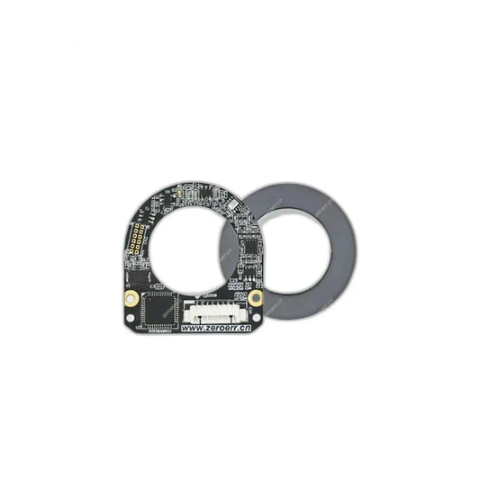ZeroErr eCoder18 magnetic encoder circuit board shown with a separate dark gray circular magnetic ring.