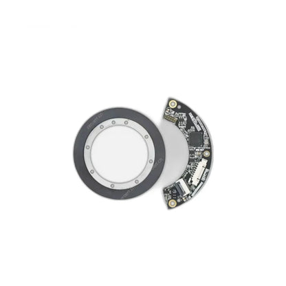 Separated ZeroErr eCoder35 encoder ring and semicircular circuit board displayed side by side on white