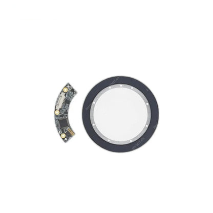 Circular magnetic encoder ring and curved circuit board displayed as separate components on white