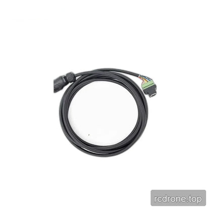 Coiled black ZeroErr eLine cable with a circular connector and a green terminal-block style connector.